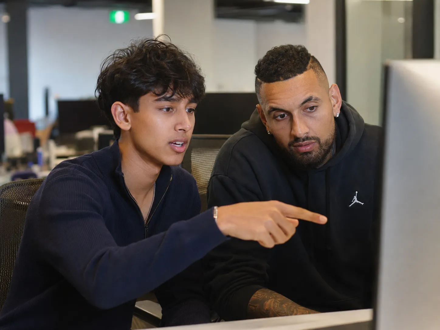 CFCG leadership reviewing positions on the trading desk